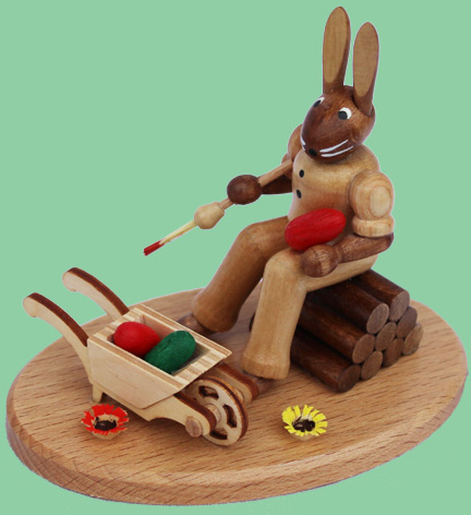 Kleiner Hase mit Schubkarre natur